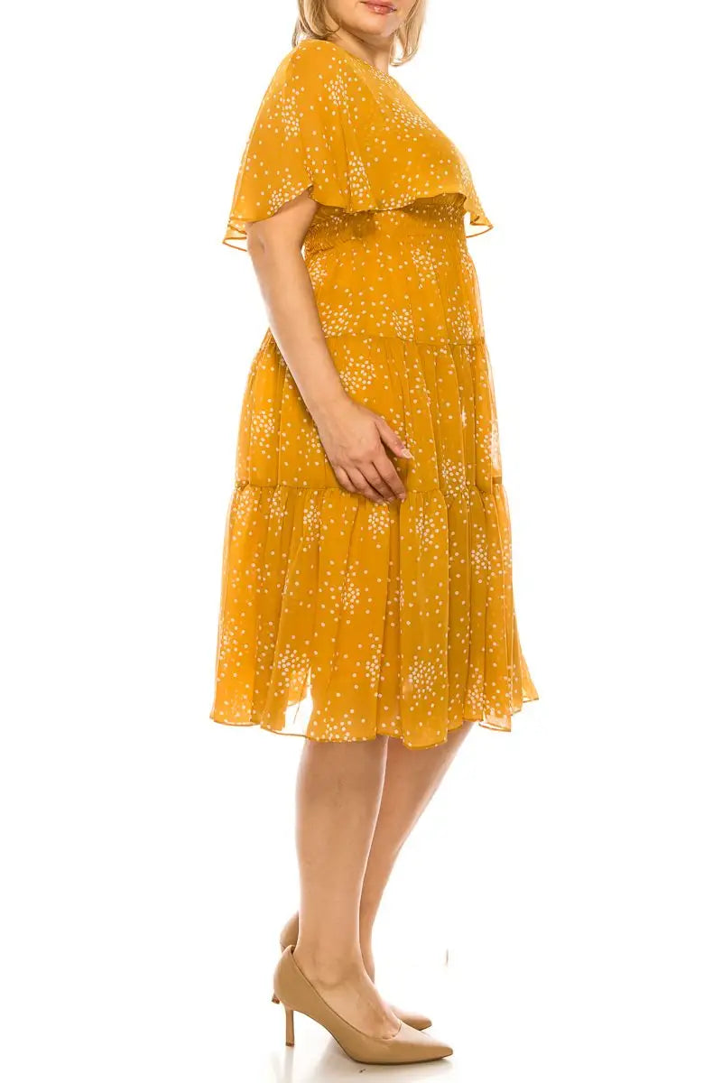 Mustard yellow Maison Tara Golden Spice tiered midi dress with floral print and flutter sleeves