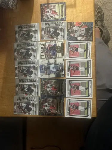 Malik Willis 16 Card Rookie Lot featuring various sports trading cards of players