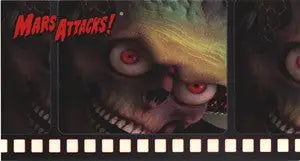 Grotesque alien face with red eyes on Mars Attacks promo card for trading cards collectors