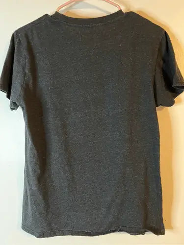Dark gray Marvel Black Panther T shirt with wear and lint, perfect Black Panther T shirt fans