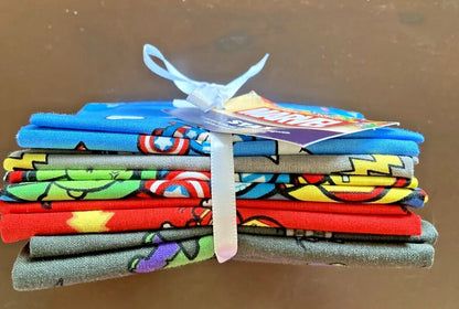 Stack of folded Marvel Comics Fat Quarter fabrics in the superhero themed Fat Quarter Stax bundle