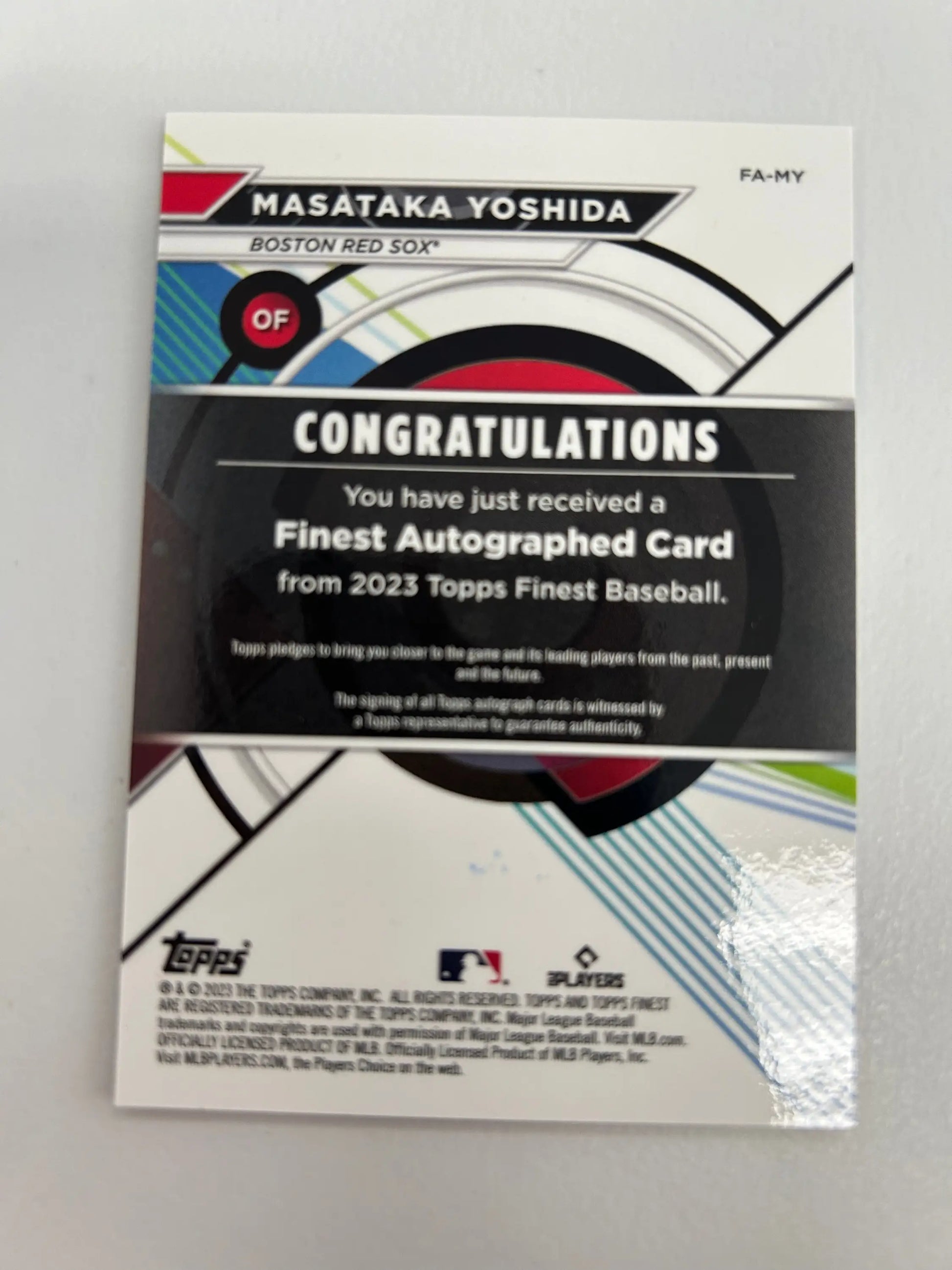 Back of Masataka Yoshida 2023 Topps Finest Orange Refractor Auto #14/25 card