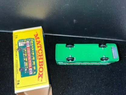 Green Matchbox No 74-B Daimler Bus with box, featuring Bus Green Esso design