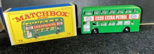 Green Matchbox 74B Daimler Bus with box, featuring Esso branding and retro design