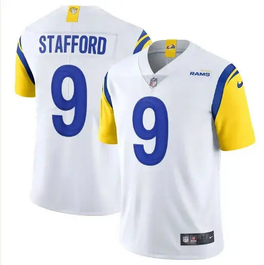 White Los Angeles Rams Nike Vapor Limited jersey with blue numbers and yellow sleeves