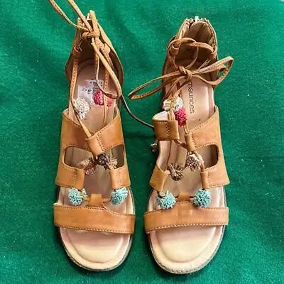 Tan leather light rust lace-up and zipper sandals block heel with colorful pom-poms