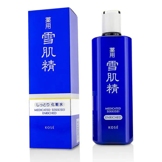 Blue bottle and box of KOSÉ Medicated Sekkisei Enriched Lotion 360ml skincare product