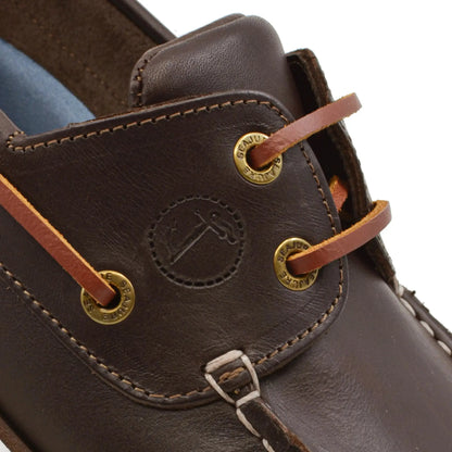Close-up of high-quality men boat shoe Forvie with dark brown leather and gold-tone eyelets