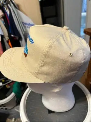 Light tan Men’s America’s Legend One Size Embroidered Reward Hat with blue and brown design