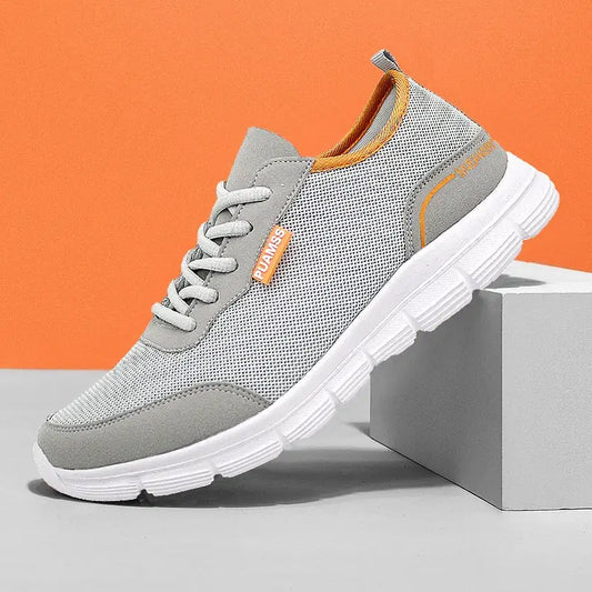 Light grey breathable mesh shoes with white sole and orange accents for men