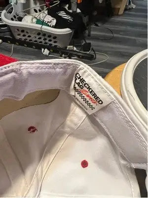 White baseball cap with red embroidered eyelets from Men’s CHECKERED FLAG Sports Daytona 500 1997 Hat