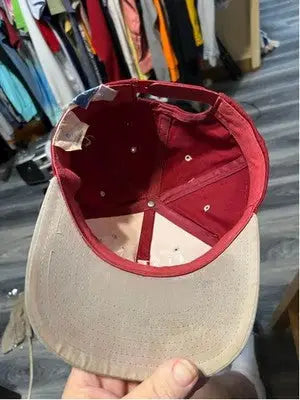 Used red baseball cap with beige brim from Drew Pearson Alabama Tide collection