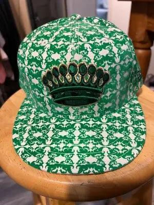 Green and white patterned men’s New Era Hat with embroidered crown in size 7 1/2