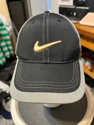 Black and gray Nike golf fitted hat with Nike Swoosh logo front view