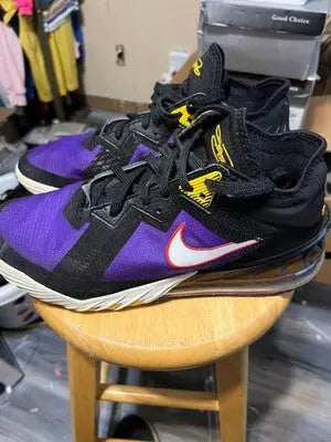 Nike LeBron athletic shoes in purple and black with white swoosh for men size 10.5