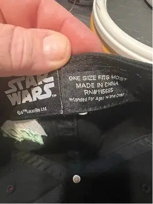 Black Star Wars baseball hat featuring Grogu and Yoda master builder design