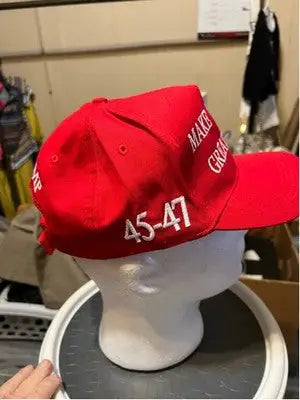 Red unbranded Make America Great Again Trump hat with white embroidery