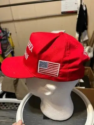 Unbranded red Make America Great Again Trump hat with American flag patch
