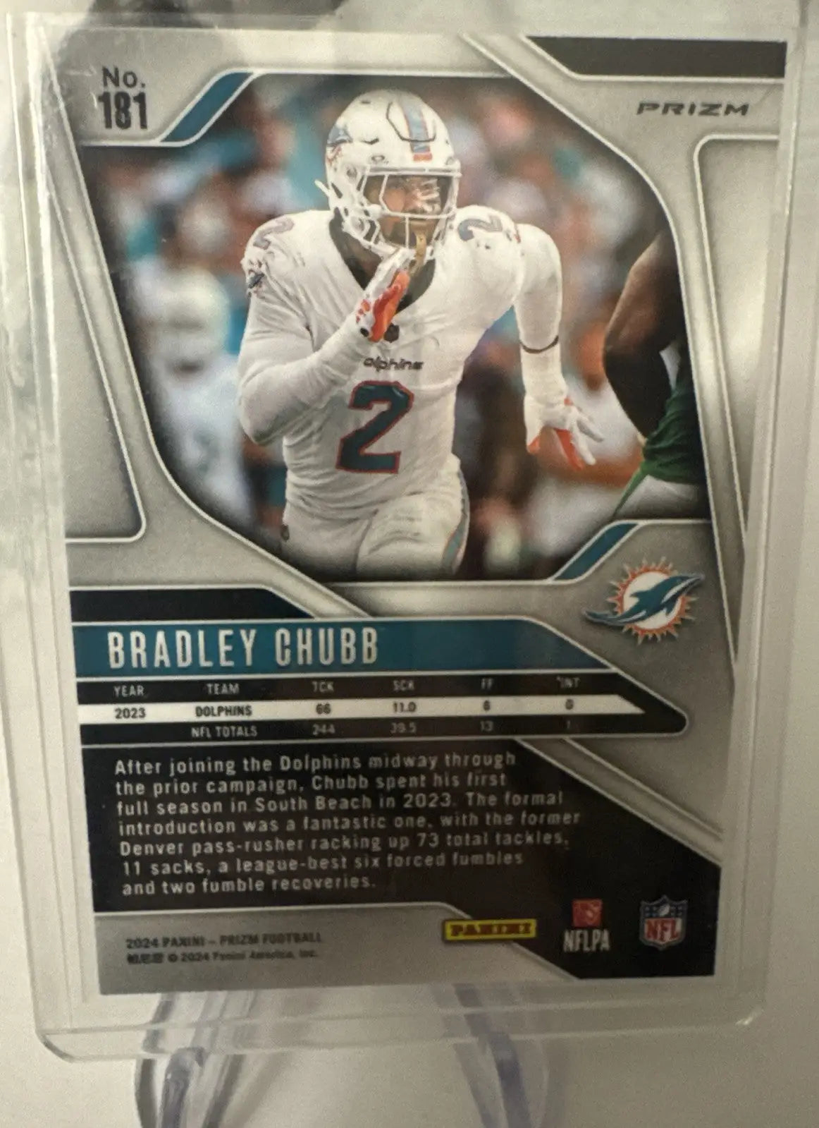 Back of a Bradley Chubb Miami Dolphins Prizm football card from Miami Dolphins card lot