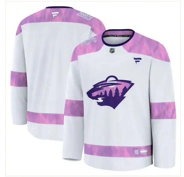 White Minnesota Wild 2024 Hockey Fights Cancer practice jersey with purple pink accents and wildcat logo