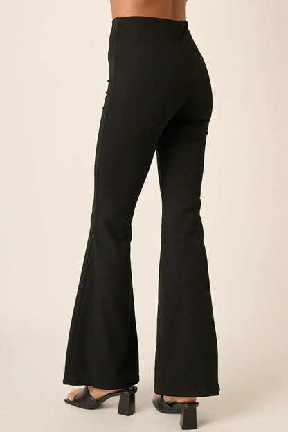 Black crepe knit flare leg pants with high waist and pockets from Mittoshop