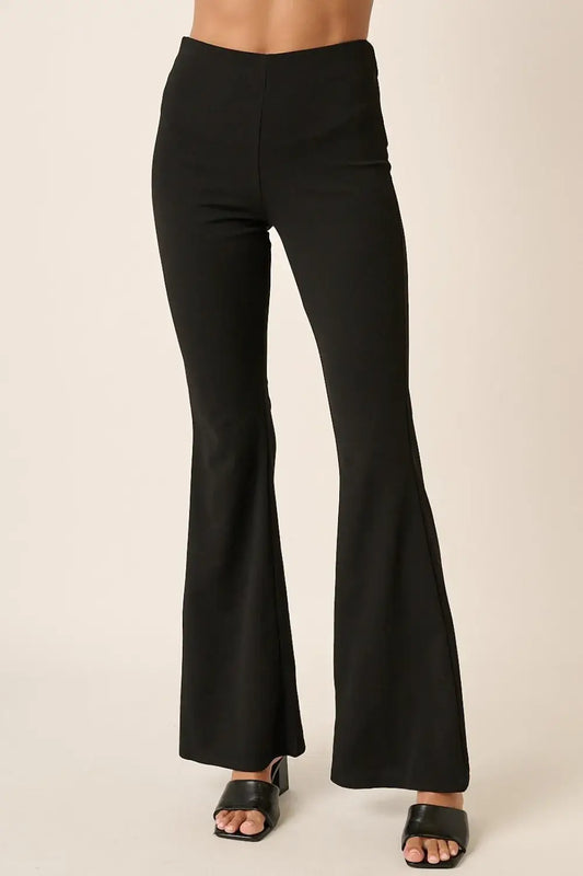 Black crepe knit flare leg pants with high waist and wide leg design for casual or semi-formal wear