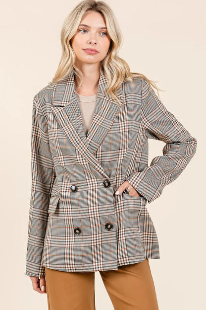 Plaid double-breasted relaxed fit blazer with black and white checkered pattern and brown buttons