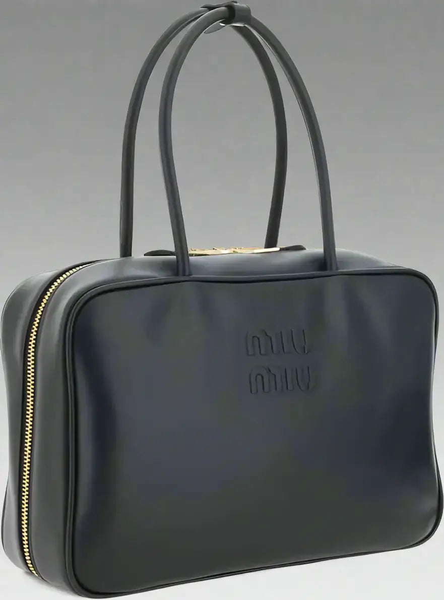 Dark blue leather handbag with double-slider zipper closure and top handles, Miu Miu Beau womens