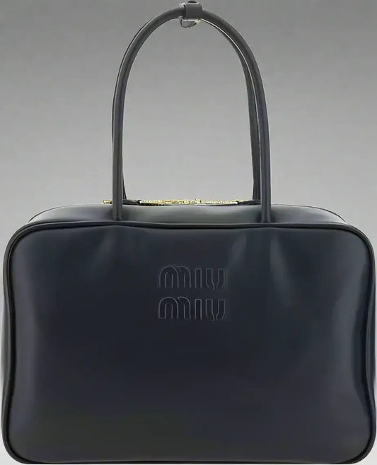 Dark blue glossy leather Miu Miu Beau handbag with double-slider zipper closure