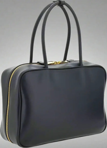 Navy blue leather handbag with gold-tone zippers and double-slider zipper closure, Miu Miu Beau womens style