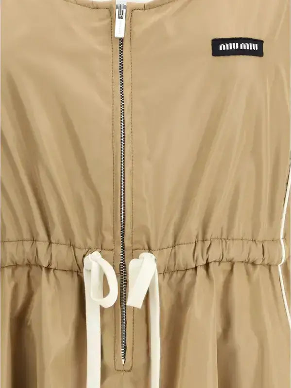 Miu Miu beige silk tec dress with front zipper and white drawstring waist