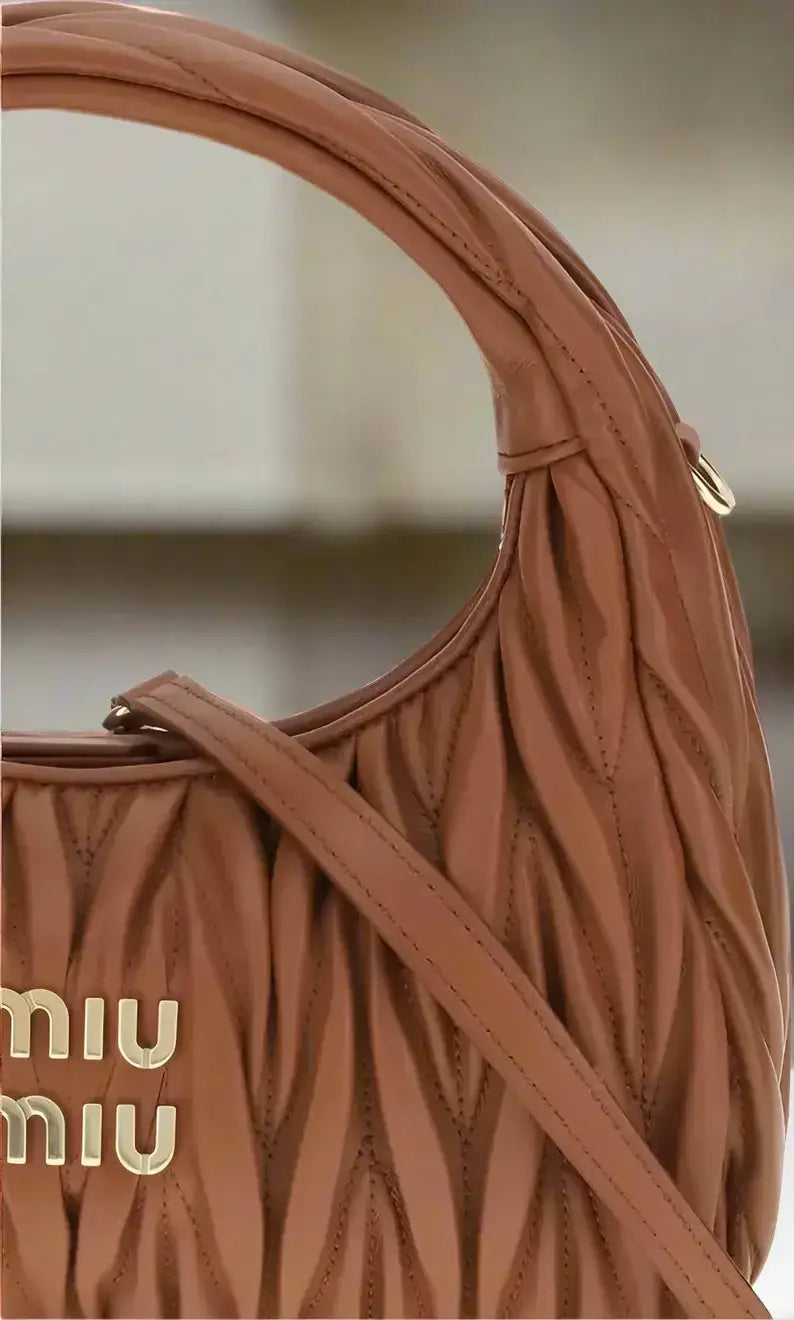 Brown Miu Miu Wandler Hobo Handbag with matelassé nappa leather, top handle, and detachable strap