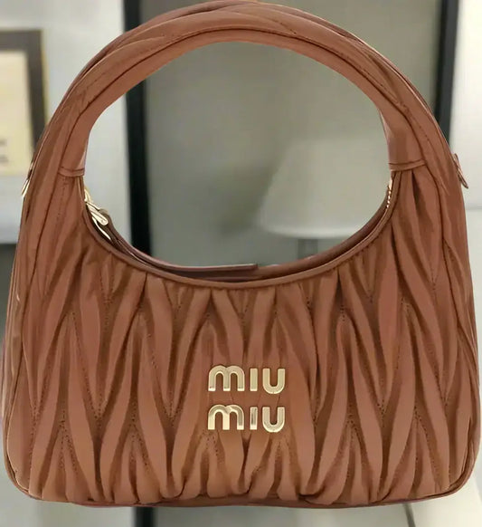 Brown quilted Miu Miu shoulder bag with top handle, Wandler Hobo Handbag style