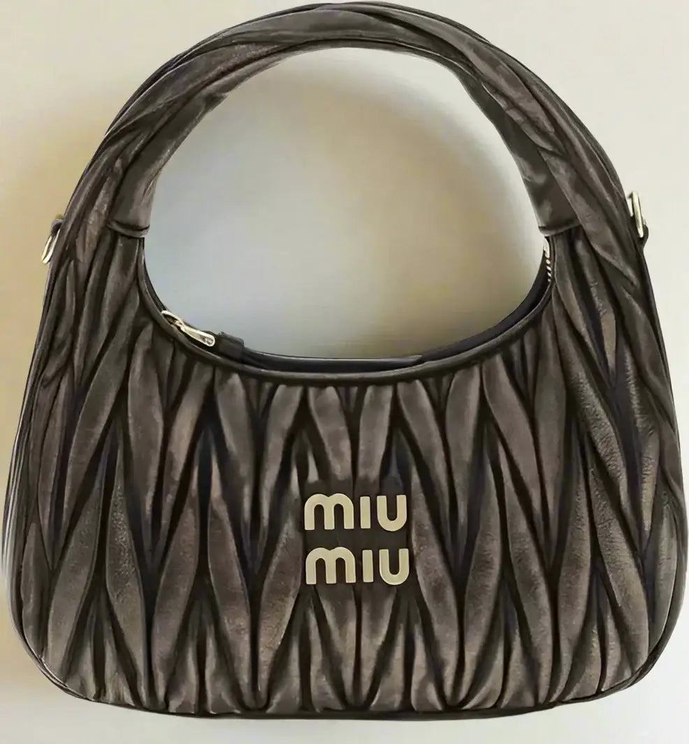 Dark grey quilted leather Miu Miu Wander shoulder bag with top zipper closure
