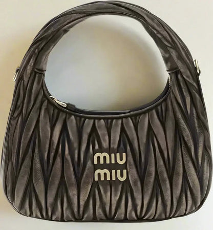 Dark grey quilted leather Miu Miu Wander shoulder bag with top zipper closure