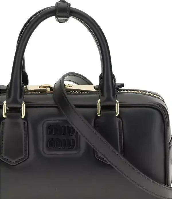 Miu Miu Arcadie handbag with black leather top-handle and gold-tone hardware