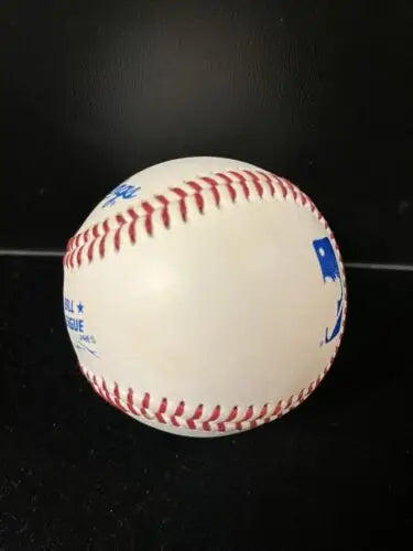 White baseball with red stitching from MLB Players Choice September Remember Logo Ball
