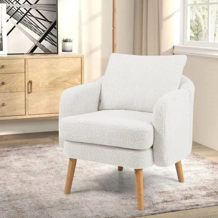 Modern white sherpa upholstered accent chair with wooden legs and mid-century modern design