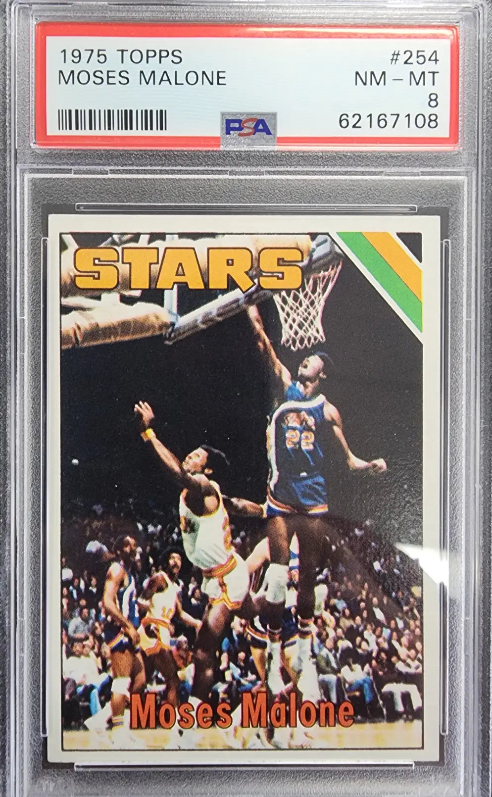 PSA-graded 1975 Topps Rookie Moses Malone basketball card featuring ABA Utah Stars action