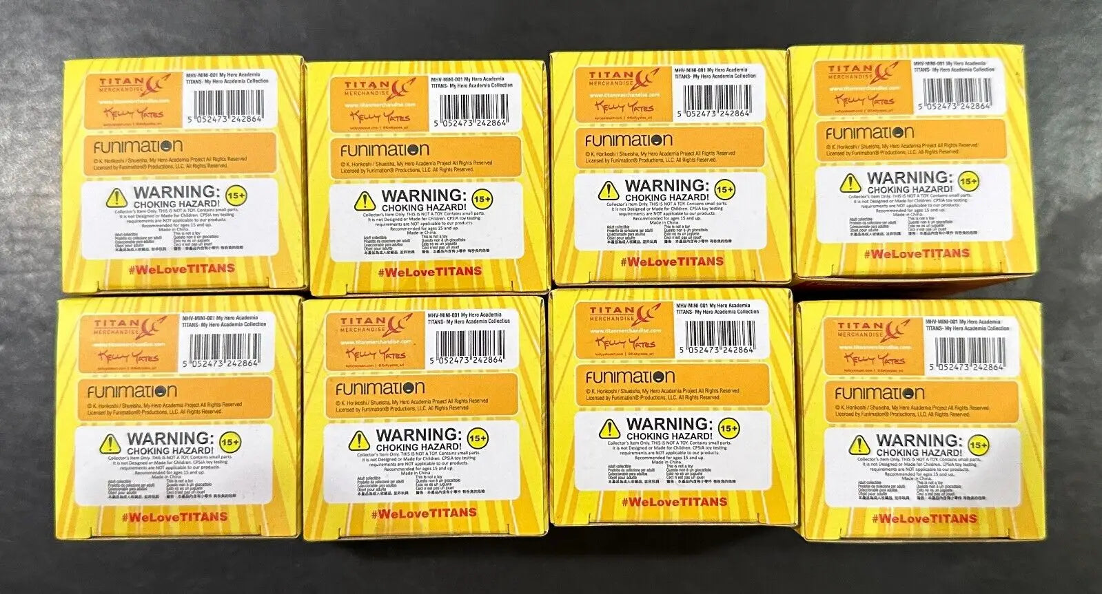 Eight yellow My Hero Academia Titans Mini Figure boxes displayed in a set