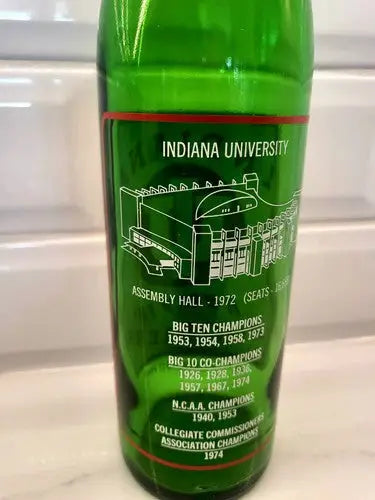 Green Indiana University commemorative glass from NCAA Championship Indiana Hoosiers collectible 7up bottle