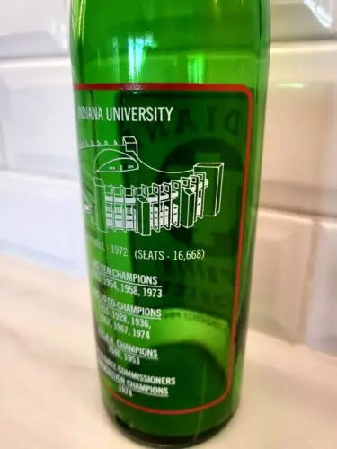 Green Indiana University glass from NCAA 1973 Indiana Hoosiers championship empty collectible 7up bottle
