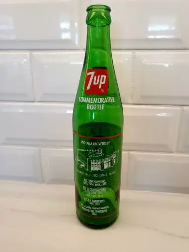 Green 7up commemorative bottle showcasing NCAA Championship Indiana Hoosiers souvenir collectible