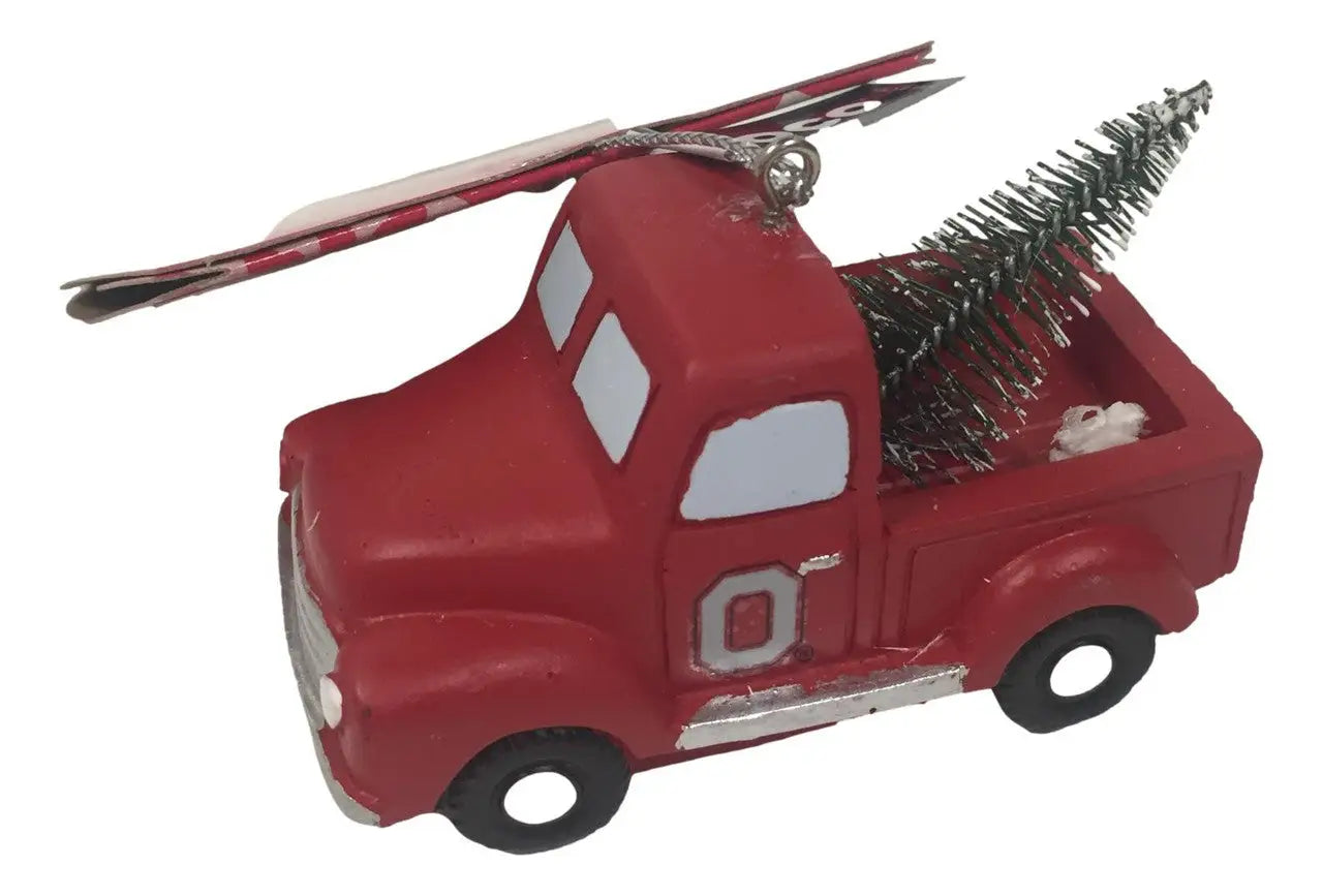 Red toy pickup truck with miniature Christmas tree, perfect for NCAA team tree ornament choose