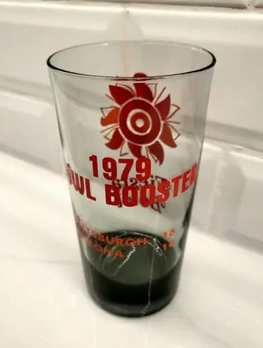 Cracked NCAA Vintage 1979 Fiesta Bowl Bowl Booster souvenir glass featuring Panthers Wildcats