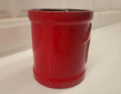 Red ceramic coffee mug with a crack featuring the Atlanta Falcons 3D logo NFL licensed