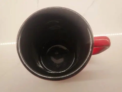 Atlanta Falcons ceramic coffee mug with red exterior and black interior NFL licensed