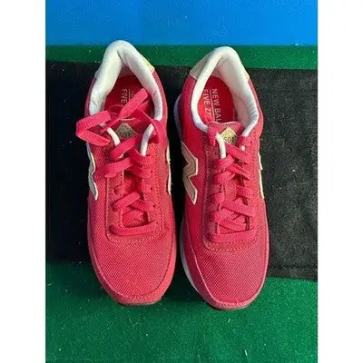 Pair of red New Balance low top sneakers for women size 5.5 athletic running shoes