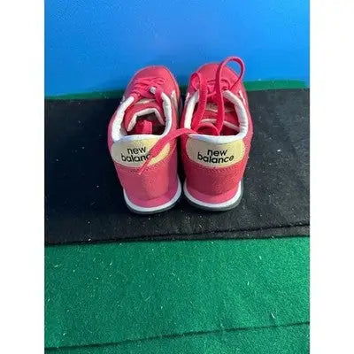 Pair of pink New Balance low top sneakers for women size 5.5 athletic running shoes