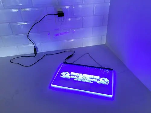 Illuminated Dallas Cowboys sign on etched glass LED sign at Texas Stadium Champions